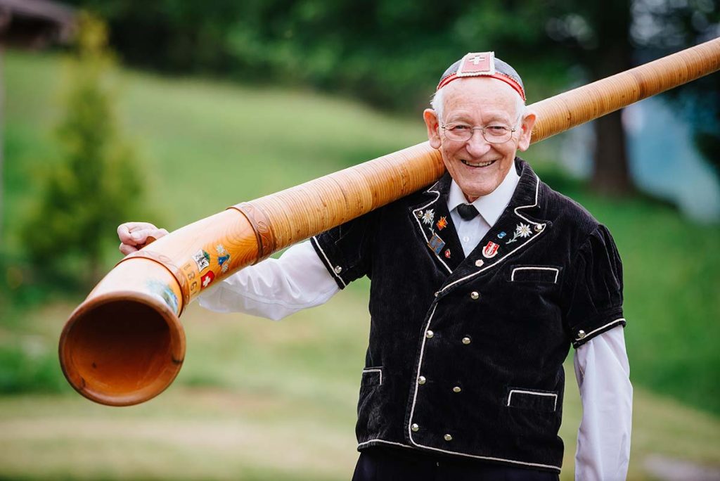 Fritz Inniger in traditional dress with Alphorn