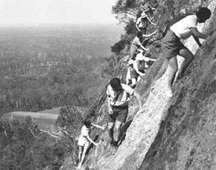 Girls climbing klettersteig